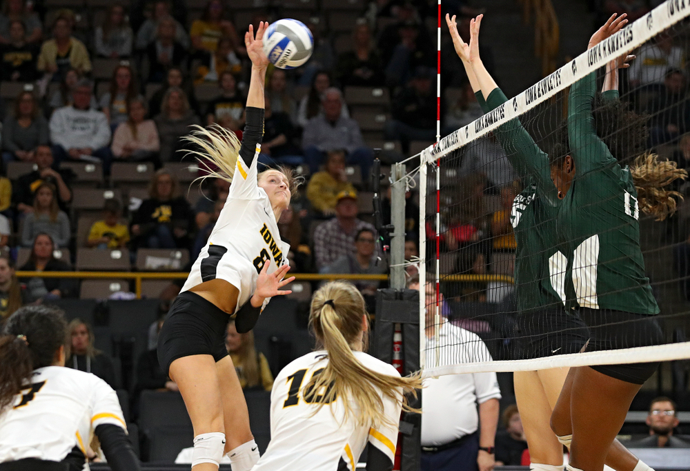 Iowa’s Kyndra Hansen (8) lines up a shot during the second set of their volleyball match at Carver-Hawkeye Arena in Iowa City on Sunday, Oct 13, 2019. (Stephen Mally/hawkeyesports.com)