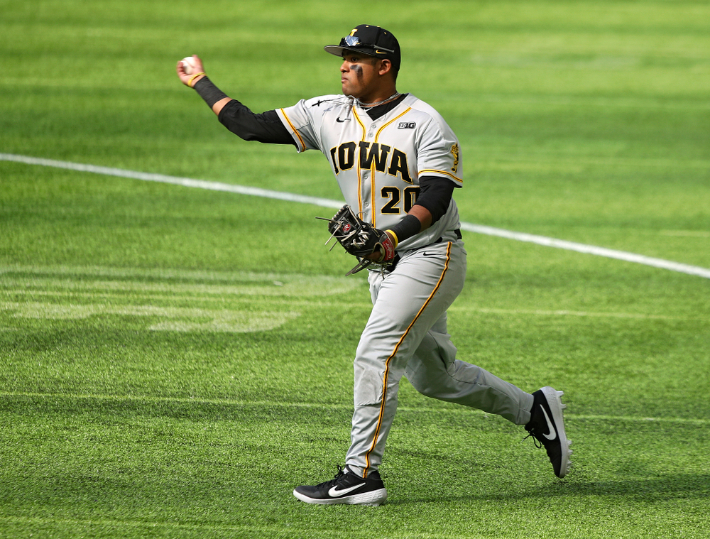 Iowa Hawkeyes infielder Izaya Fullard (20) throws to first for an out during the fourth inning of their CambriaCollegeClassic game at U.S. Bank Stadium in Minneapolis, Minn. on Friday, February 28, 2020. (Stephen Mally/hawkeyesports.com)