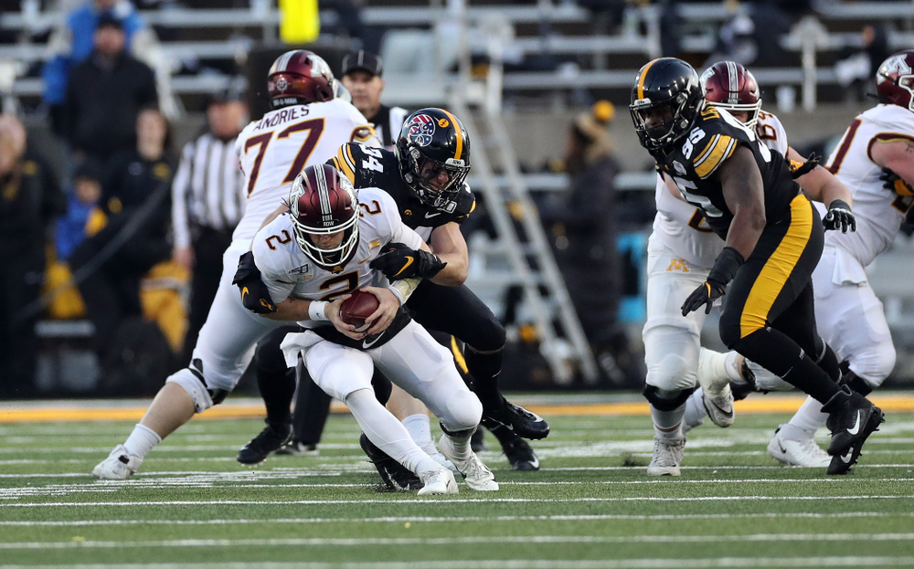 Iowa Hawkeyes linebacker Kristian Welch (34) gets a sack against the Minnesota Golden Gophers Saturday, November 16, 2019 at Kinnick Stadium. (Brian Ray/hawkeyesports.com)