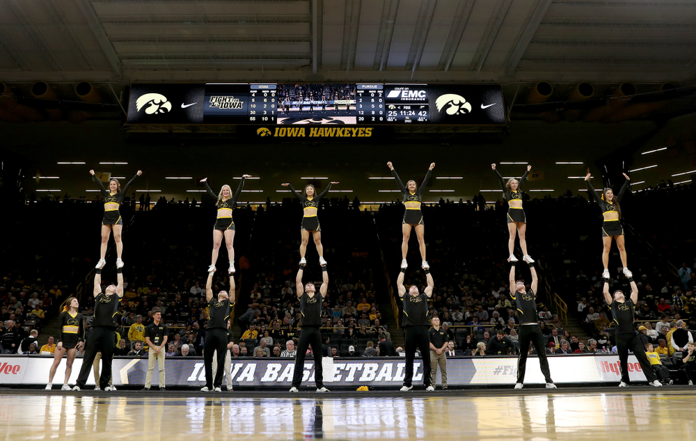 The Iowa Cheerleaders and Dance Team perform on senior night at half-time of the Iowa Hawkeyes game against the Purdue Boilermakers Tuesday, March 3, 2020 at Carver-Hawkeye Arena. (Brian Ray/hawkeyesports.com)