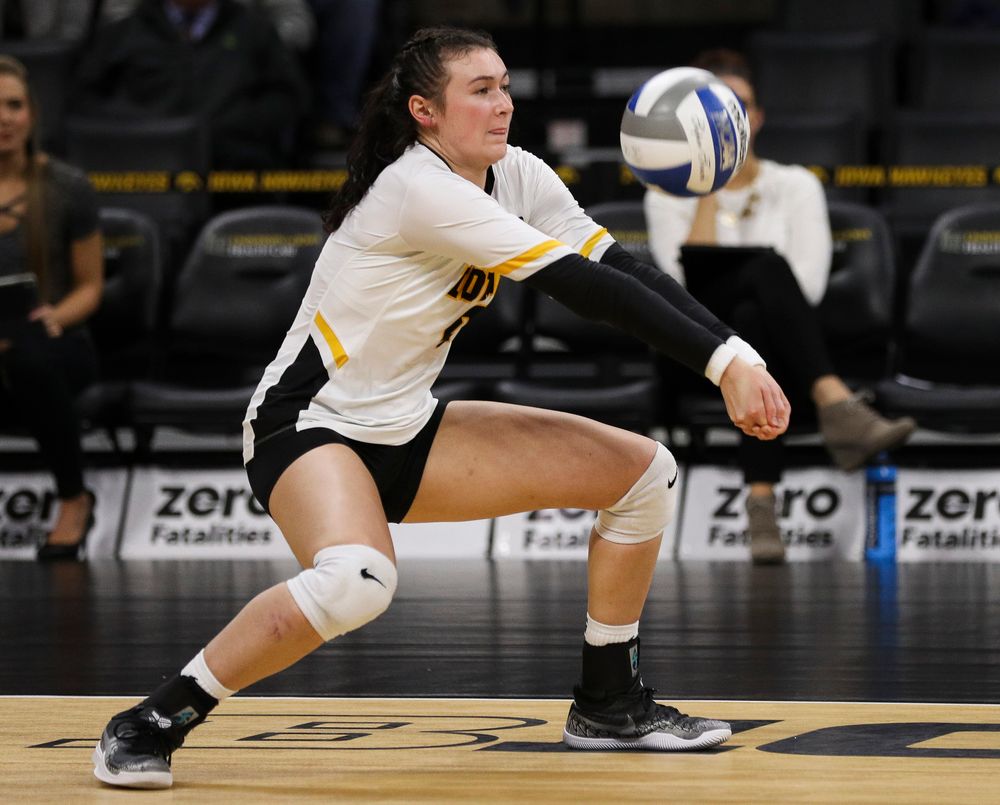 Iowa Hawkeyes defensive specialist Halle Johnston (4) bumps the ball during a match against Nebraska at Carver-Hawkeye Arena on November 7, 2018. (Tork Mason/hawkeyesports.com)
