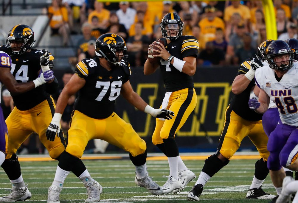 Iowa Hawkeyes quarterback Nate Stanley (4) drops back to pass during a game against Northern Iowa at Kinnick Stadium on September 15, 2018. (Tork Mason/hawkeyesports.com)
