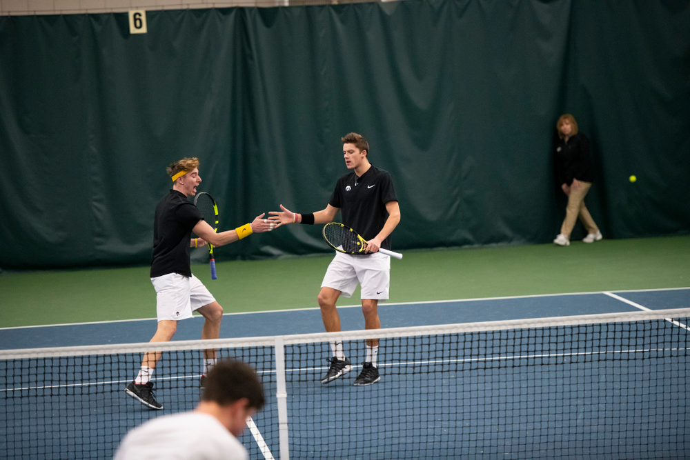 The Iowa men's tennis team competes against Cornell in The Rise Tennis Center in Ithaca, NY on Sunday, Feb. 24, 2019.
