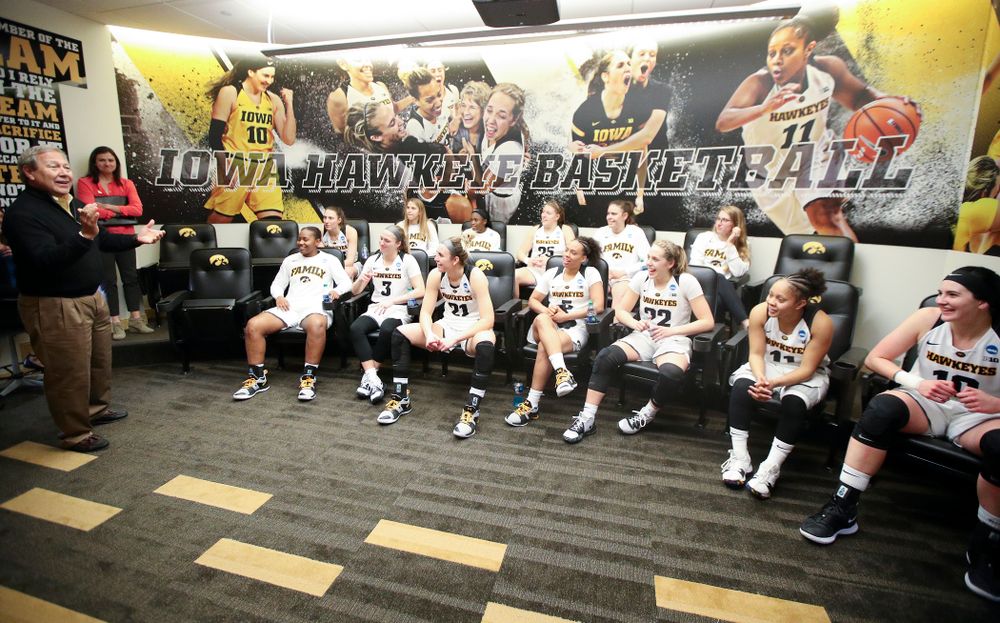 University of Iowa president Bruce Harreld talks with the team after winning their second round game in the 2019 NCAA Women's Basketball Tournament at Carver Hawkeye Arena in Iowa City on Sunday, Mar. 24, 2019. (Stephen Mally for hawkeyesports.com)