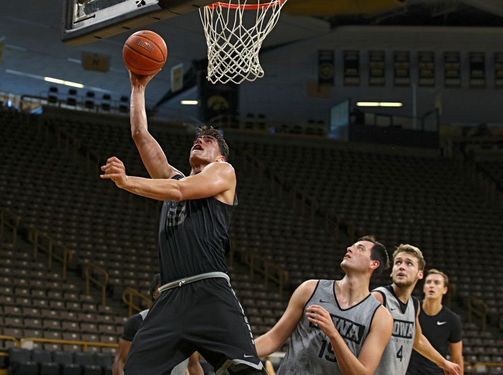 Iowa Hawkeyes center Luka Garza (55) puts up a shot during practice at Carver-Hawkeye Arena in Iowa City on Monday, Sep 30, 2019. (Stephen Mally/hawkeyesports.com)