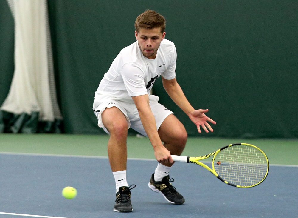 Iowa’s Will Davies returns a shot during his doubles match at the Hawkeye Tennis and Recreation Complex in Iowa City on Sunday, February 16, 2020. (Stephen Mally/hawkeyesports.com)