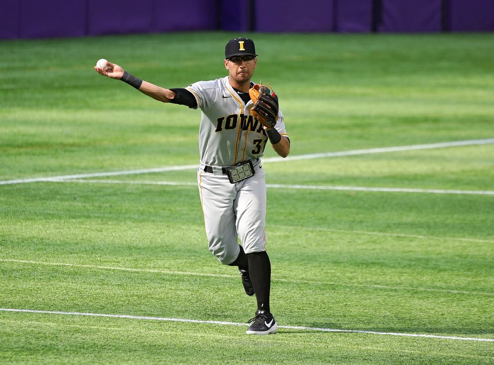 Iowa Hawkeyes infielder Matthew Sosa (31) throws to first during the third inning of their CambriaCollegeClassic game at U.S. Bank Stadium in Minneapolis, Minn. on Friday, February 28, 2020. (Stephen Mally/hawkeyesports.com)