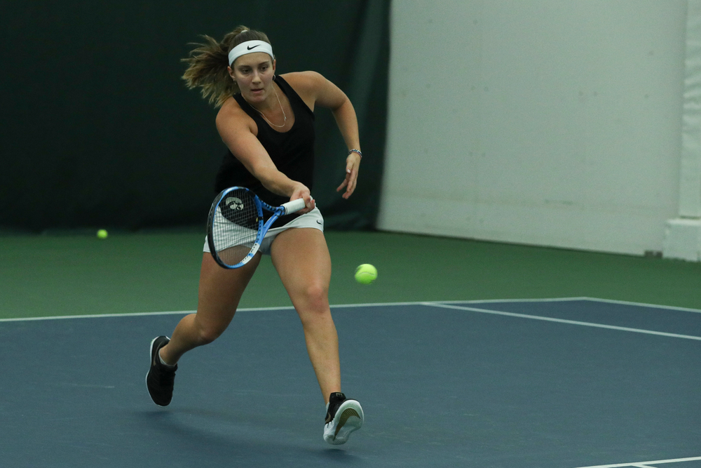 Iowa’s Ashleigh Jacobs returns a hit during the Iowa women’s tennis meet vs DePaul on Friday, February 21, 2020 at the Hawkeye Tennis and Recreation Complex. (Lily Smith/hawkeyesports.com)