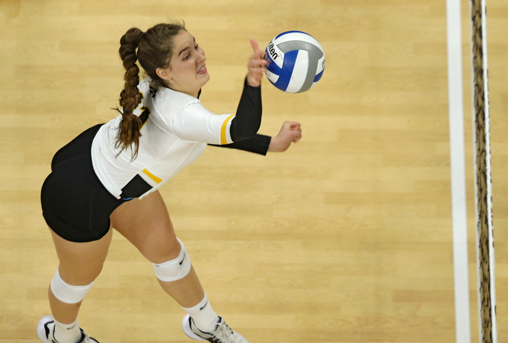 Iowa’s Blythe Rients (11) sends the ball over during the third set of their match at Carver-Hawkeye Arena in Iowa City on Saturday, Nov 30, 2019. (Stephen Mally/hawkeyesports.com)