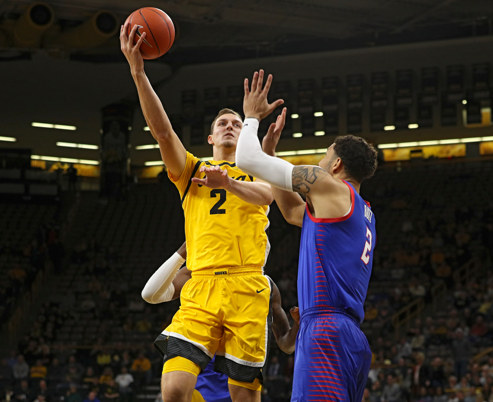 Iowa Hawkeyes forward Jack Nunge (2) puts up a shot during the first half of their game at Carver-Hawkeye Arena in Iowa City on Monday, Nov 11, 2019. (Stephen Mally/hawkeyesports.com)
