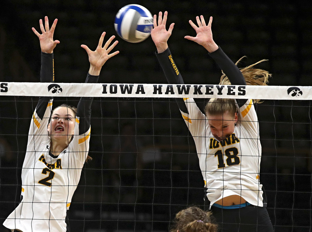 Iowa’s Courtney Buzzerio (2) and Hannah Clayton (18) block a shot during their Big Ten/Pac-12 Challenge match at Carver-Hawkeye Arena in Iowa City on Saturday, Sep 7, 2019. (Stephen Mally/hawkeyesports.com)