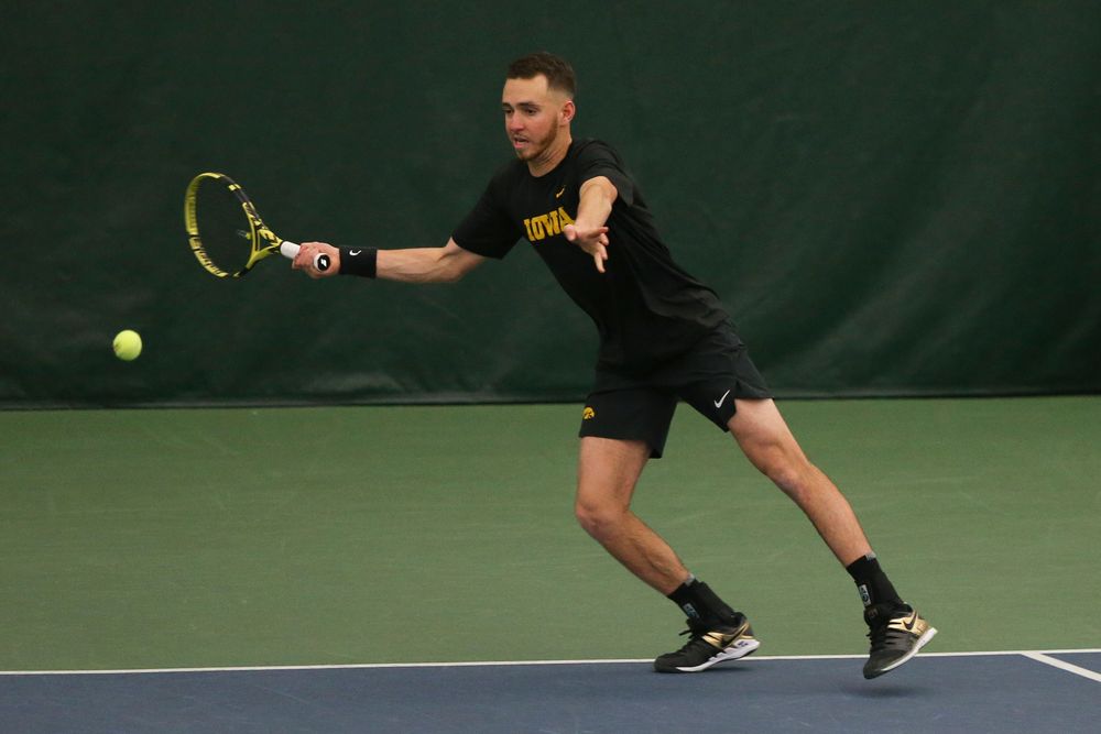 Iowa’s Kareem Allaf returns a ball during the Iowa men’s tennis meet vs VCU on Saturday, February 29, 2020 at the Hawkeye Tennis and Recreation Complex. (Lily Smith/hawkeyesports.com)