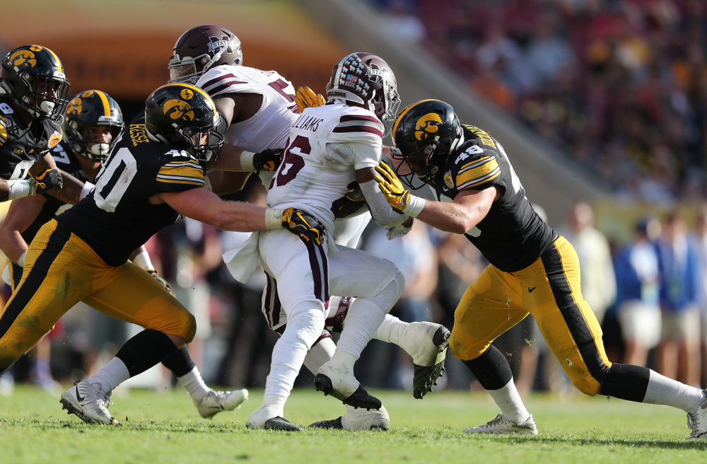 Iowa Hawkeyes defensive end Parker Hesse (40) and linebacker Jack Hockaday (48) during their Outback Bowl Tuesday, January 1, 2019 at Raymond James Stadium in Tampa, FL. (Brian Ray/hawkeyesports.com)