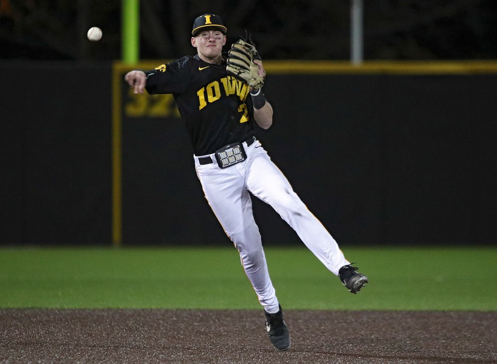 Iowa infielder Brendan Sher (2) throws to first for an out during the ninth inning of their game at Duane Banks Field in Iowa City on Tuesday, March 3, 2020. (Stephen Mally/hawkeyesports.com)