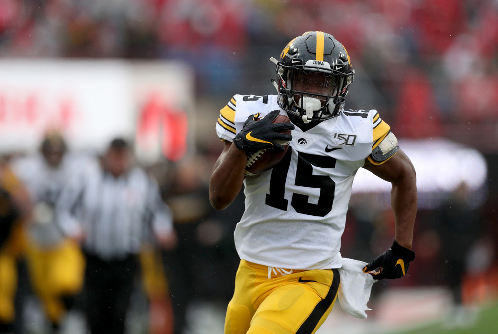 Iowa Hawkeyes running back Tyler Goodson (15) scores on a long touchdown run against the Nebraska Cornhuskers Friday, November 29, 2019 at Memorial Stadium in Lincoln, Neb. (Brian Ray/hawkeyesports.com)