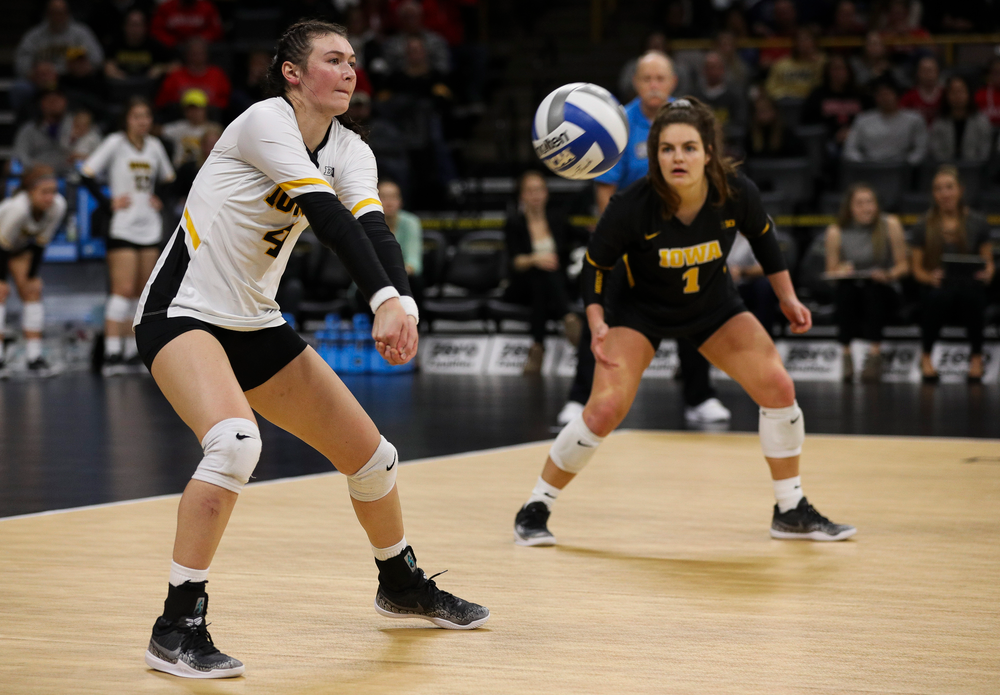 Iowa Hawkeyes defensive specialist Halle Johnston (4) bumps the ball during a match against Nebraska at Carver-Hawkeye Arena on November 7, 2018. (Tork Mason/hawkeyesports.com)