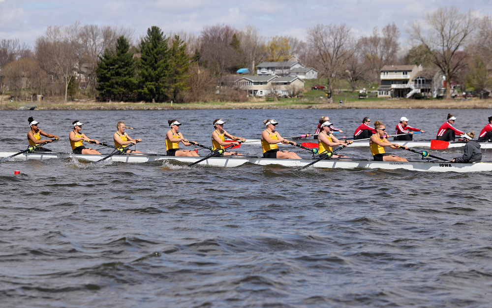 Iowa's Naomi Visser (from left), Elena Waiglein, Paige Schlapkohl, Hannah Greenlee, Hunter Koenigsfeld, Contessa Harold, Katie Pearson, Eve Stewart, and Logan Jones during their 1 Varsity 8 race against Wisconsin in their Big Ten Double Dual Rowing Regatta at Lake Macbride in Solon on Saturday, Apr. 13, 2019. (Stephen Mally/hawkeyesports.com)