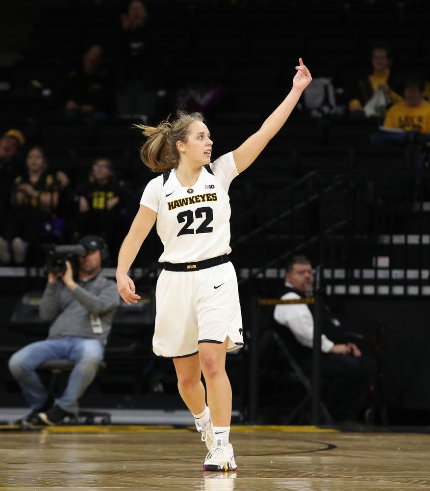 Iowa Hawkeyes guard Kathleen Doyle (22) pumps up the crowd against the Wisconsin Badgers Monday, January 7, 2019 at Carver-Hawkeye Arena. (Brian Ray/hawkeyesports.com)