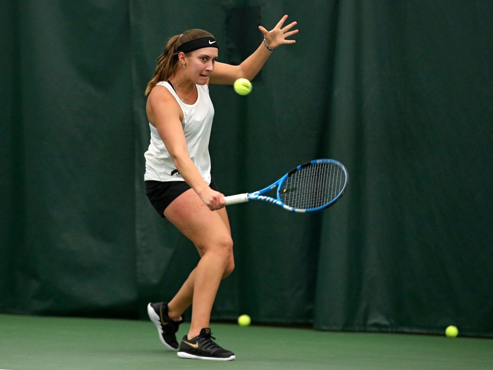 Iowa’s Ashleigh Jacobs returns a shot during her singles match at the Hawkeye Tennis and Recreation Complex in Iowa City on Sunday, February 23, 2020. (Stephen Mally/hawkeyesports.com)