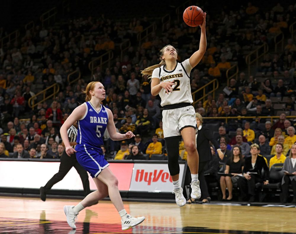 Iowa Hawkeyes guard Kathleen Doyle (22) makes a basket during the fourth quarter of their game at Carver-Hawkeye Arena in Iowa City on Saturday, December 21, 2019. (Stephen Mally/hawkeyesports.com)