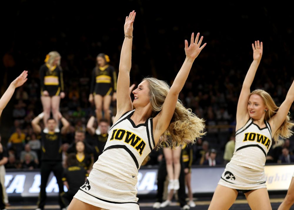 The Iowa Cheerleaders and Dance Team perform on senior night at half-time of the Iowa Hawkeyes game against the Purdue Boilermakers Tuesday, March 3, 2020 at Carver-Hawkeye Arena. (Brian Ray/hawkeyesports.com)