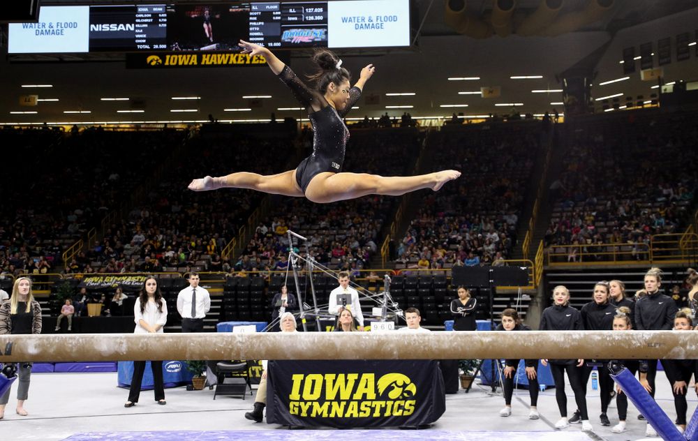 Iowa's Clair Kaji competes on the beem against Illinois Saturday, February 16, 2019 at Carver-Hawkeye Arena. (Brian Ray/hawkeyesports.com)