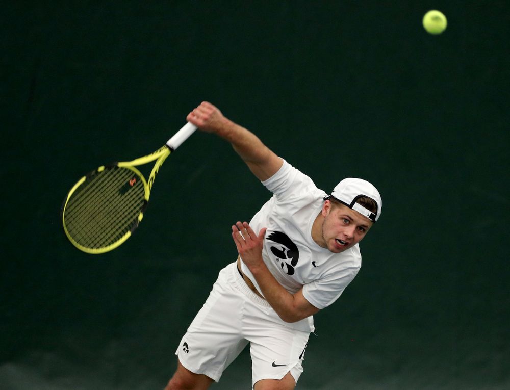Iowa’s Will Davies against Cornell Sunday, March 8, 2020 at the Hawkeye Tennis and Recreation Center. (Brian Ray/hawkeyesports.com)