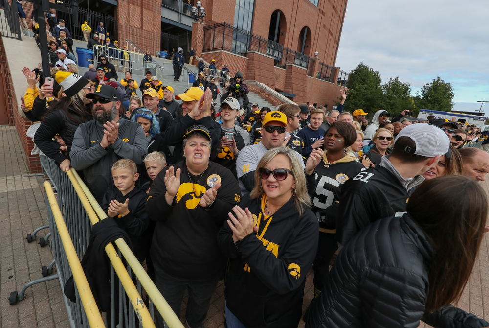 Fans cheer for the Iowa Hawkeyes as they arrive for their game against the Michigan Wolverines Saturday, October 5, 2019 at Michigan Stadium in Ann Arbor, MI. (Brian Ray/hawkeyesports.com)