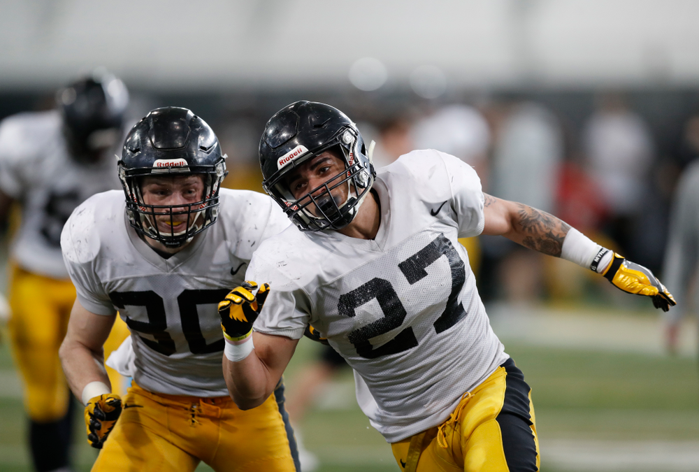 Iowa Hawkeyes defensive back Amani Hooker (27) and defensive back Jake Gervase (30) during spring practice Thursday, March 29, 2018 at the Hansen Football Performance Center. (Brian Ray/hawkeyesports.com)