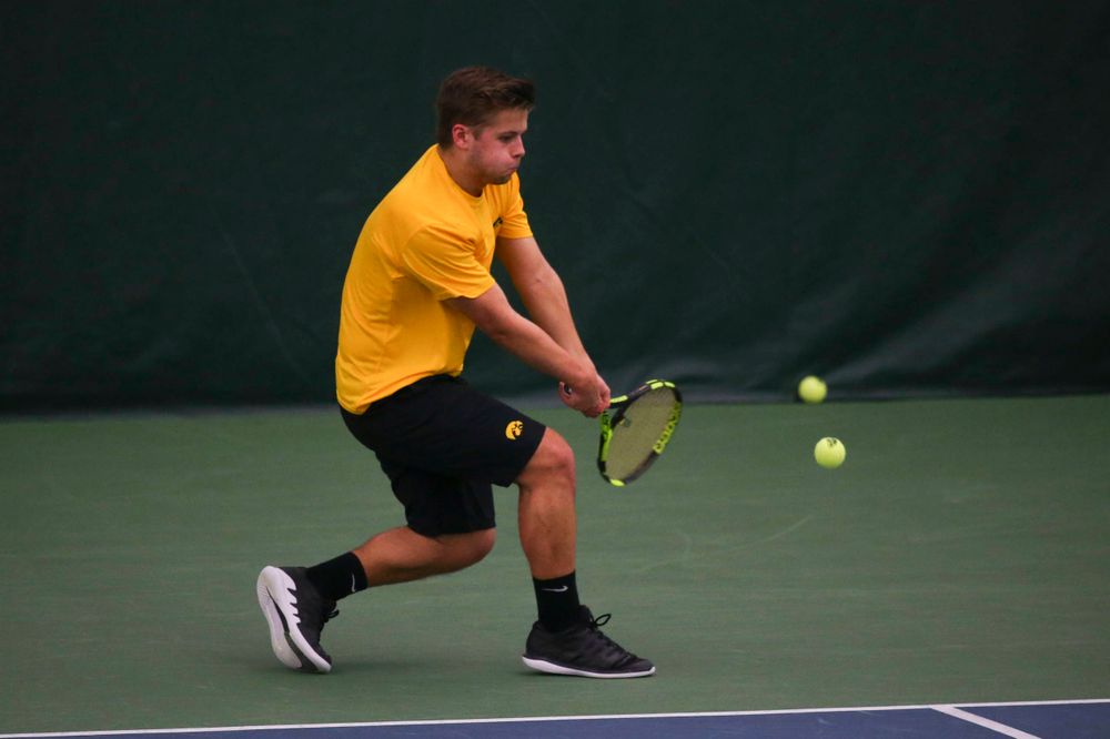 Iowa's Will Davies at a tennis match vs Drake Friday, March 8, 2019 at the Hawkeye Tennis and Recreation Complex. (Lily Smith/hawkeyesports.com)