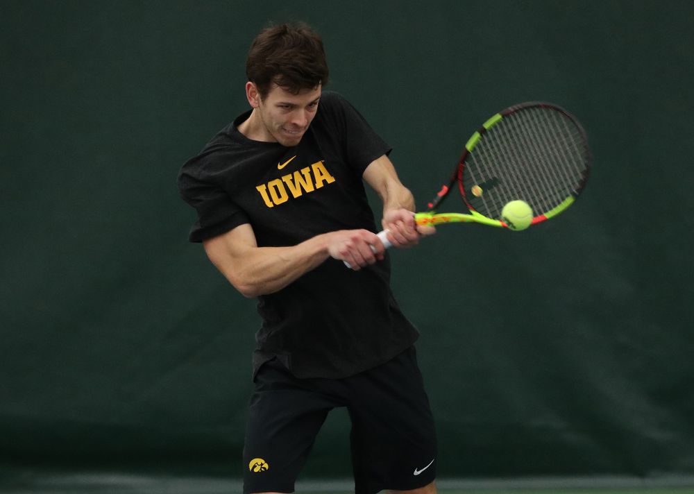 Iowa's Piotr Smietana against UMKC Friday, February 15, 2019 at the Hawkeye Tennis and Recreation Complex. (Brian Ray/hawkeyesports.com)
