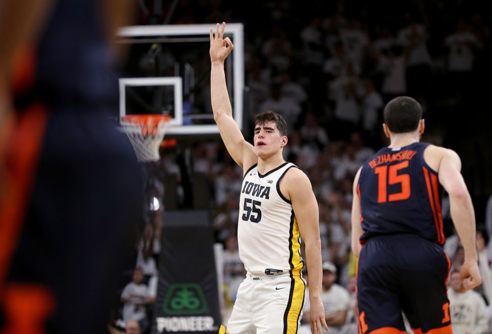 Iowa Hawkeyes forward Luka Garza (55) celebrates a three point basket against the Illinois Fighting Illini Sunday, February 2, 2020 at Carver-Hawkeye Arena. (Brian Ray/hawkeyesports.com)