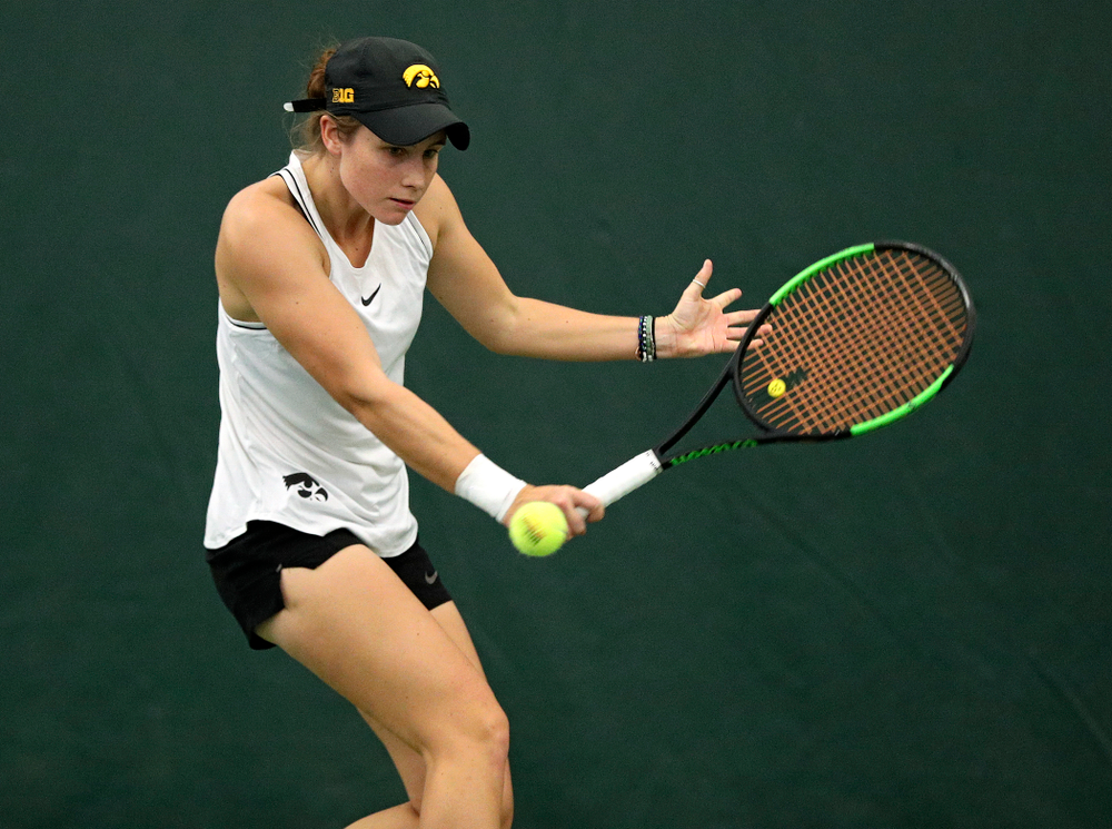 Iowa’s Elise Van Heuvelen returns a shot during her singles match at the Hawkeye Tennis and Recreation Complex in Iowa City on Sunday, February 16, 2020. (Stephen Mally/hawkeyesports.com)