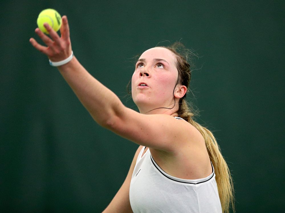 Iowa’s Samantha Mannix serves during her singles match at the Hawkeye Tennis and Recreation Complex in Iowa City on Sunday, February 16, 2020. (Stephen Mally/hawkeyesports.com)