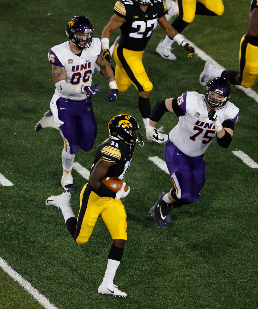 Iowa Hawkeyes defensive back Michael Ojemudia (11) returns an interception against the Northern Iowa Panthers Saturday, September 15, 2018 at Kinnick Stadium. (Brian Ray/hawkeyesports.com)