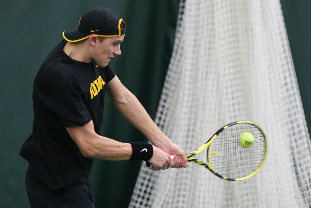Iowa’s Joe Tyler returns a hit during the Iowa men’s tennis meet vs VCU on Saturday, February 29, 2020 at the Hawkeye Tennis and Recreation Complex. (Lily Smith/hawkeyesports.com)