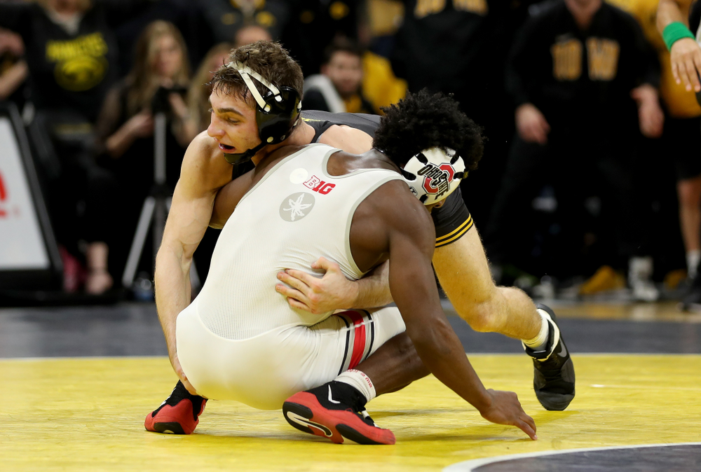 Iowa’s Austin DeSanto wrestles Ohio State’s Jordan Decatur at 133 pounds Friday, January 24, 2020 at Carver-Hawkeye Arena. DeSanto won the match with a 21-3 tech fall. (Brian Ray/hawkeyesports.com)