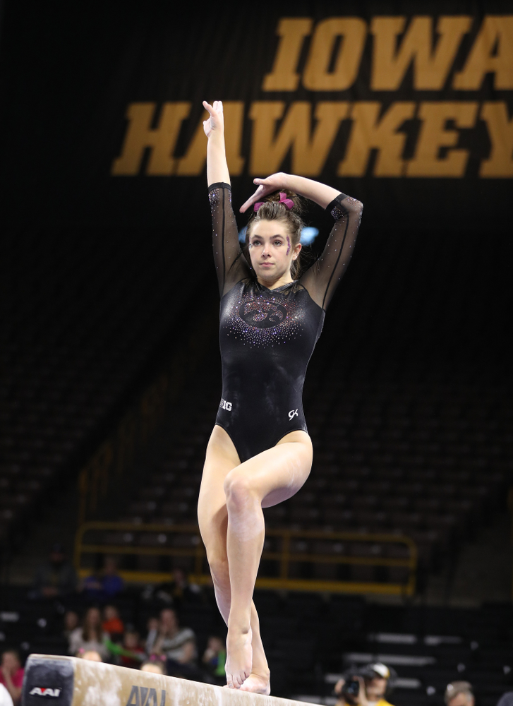 Iowa's Bridget Killian competes on the beam during their meet against the Minnesota Golden Gophers Saturday, January 19, 2019 at Carver-Hawkeye Arena. (Brian Ray/hawkeyesports.com)