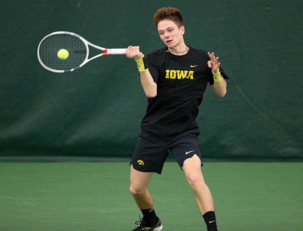 Iowa’s Jason Kerst returns a shot during their match at the Hawkeye Tennis and Recreation Complex in Iowa City on Thursday, January 16, 2020. (Stephen Mally/hawkeyesports.com)