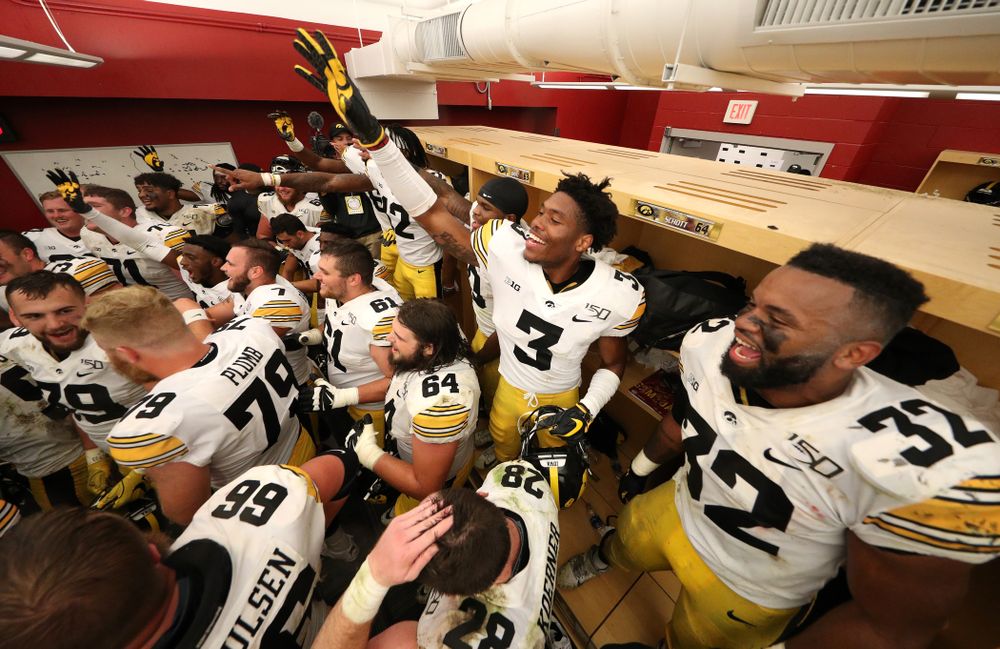 Iowa Hawkeyes wide receiver Tyrone Tracy Jr. (3) and Iowa Hawkeyes linebacker Djimon Colbert (32) celebrate their win over the Iowa State Cyclones Saturday, September 14, 2019 in Ames, Iowa. (Brian Ray/hawkeyesports.com)