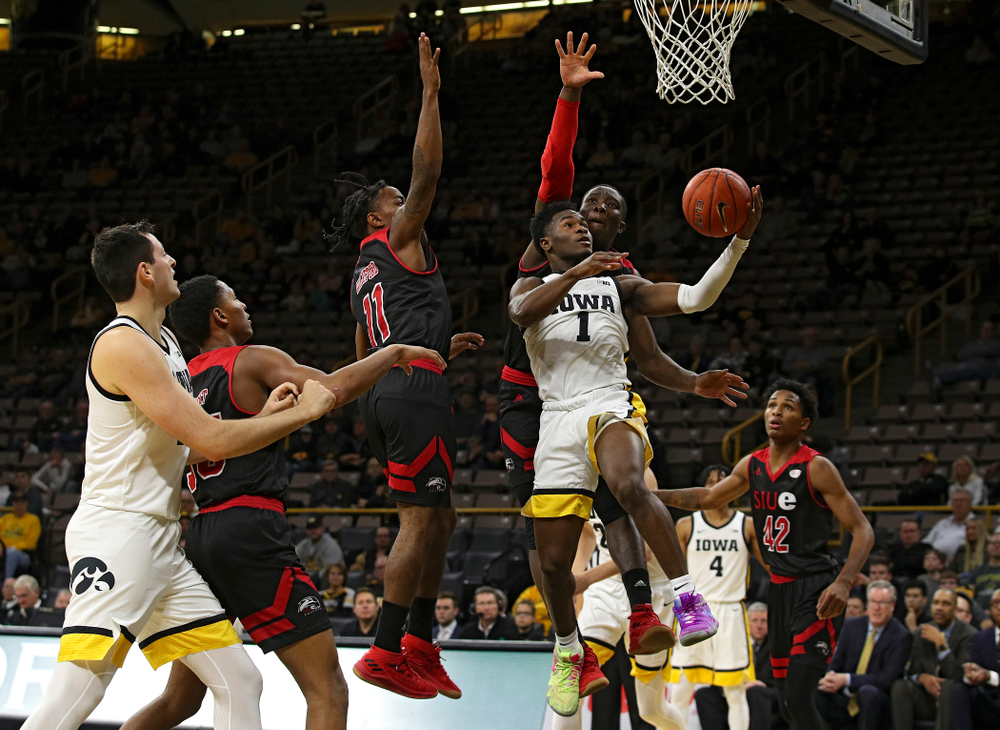 Iowa Hawkeyes guard Joe Toussaint (1) puts up a shot during the second half of their game at Carver-Hawkeye Arena in Iowa City on Friday, Nov 8, 2019. (Stephen Mally/hawkeyesports.com)