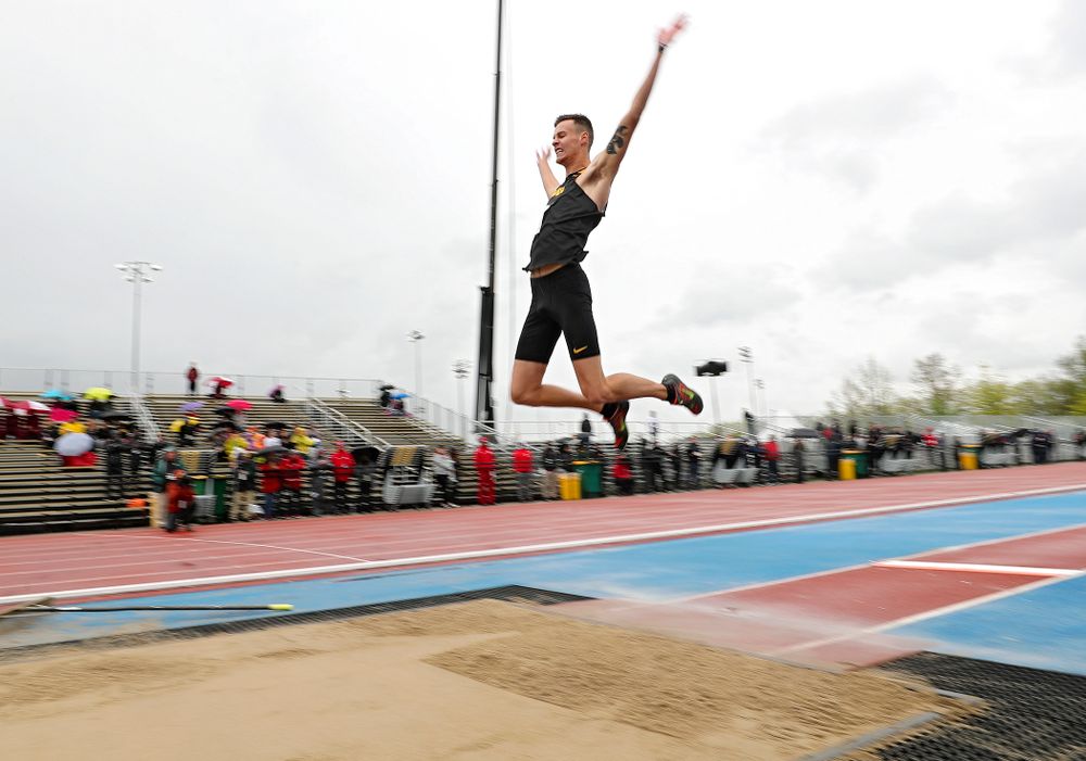 Iowa's Cooper Koenig jump in the men’s long jump event on the second day of the Big Ten Outdoor Track and Field Championships at Francis X. Cretzmeyer Track in Iowa City on Saturday, May. 11, 2019. (Stephen Mally/hawkeyesports.com)