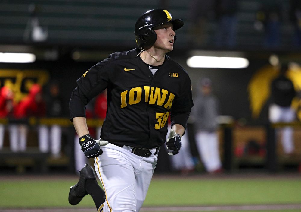 Iowa designated hitter Trenton Wallace (38) hits a home run during the eighth inning of their game at Duane Banks Field in Iowa City on Tuesday, March 3, 2020. (Stephen Mally/hawkeyesports.com)