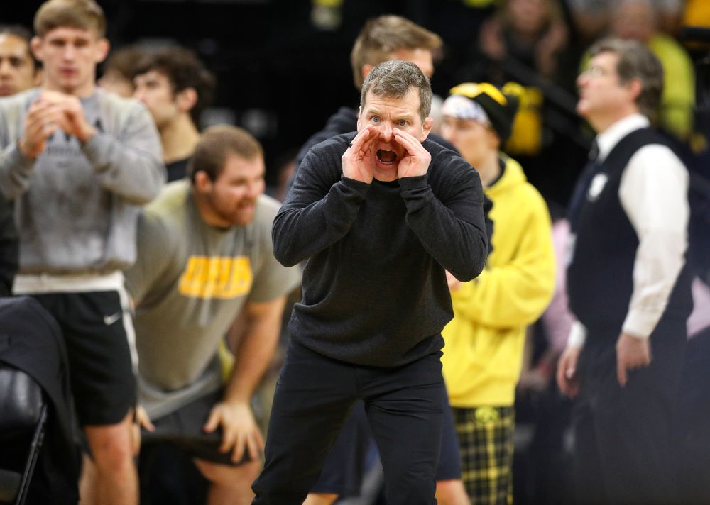 Iowa associate head coach Terry Brands shouts to Michael Kemerer in his 174-pound match during their dual at Carver-Hawkeye Arena in Iowa City on Friday, January 31, 2020. (Stephen Mally/hawkeyesports.com)