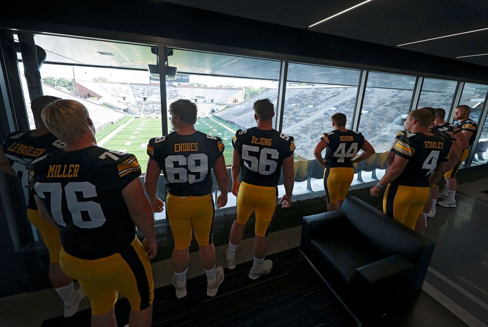 Players look at the field from the new Ted Pacha Family Club at Kinnick Stadium in Iowa City on Friday, Aug 9, 2019. (Stephen Mally/hawkeyesports.com)
