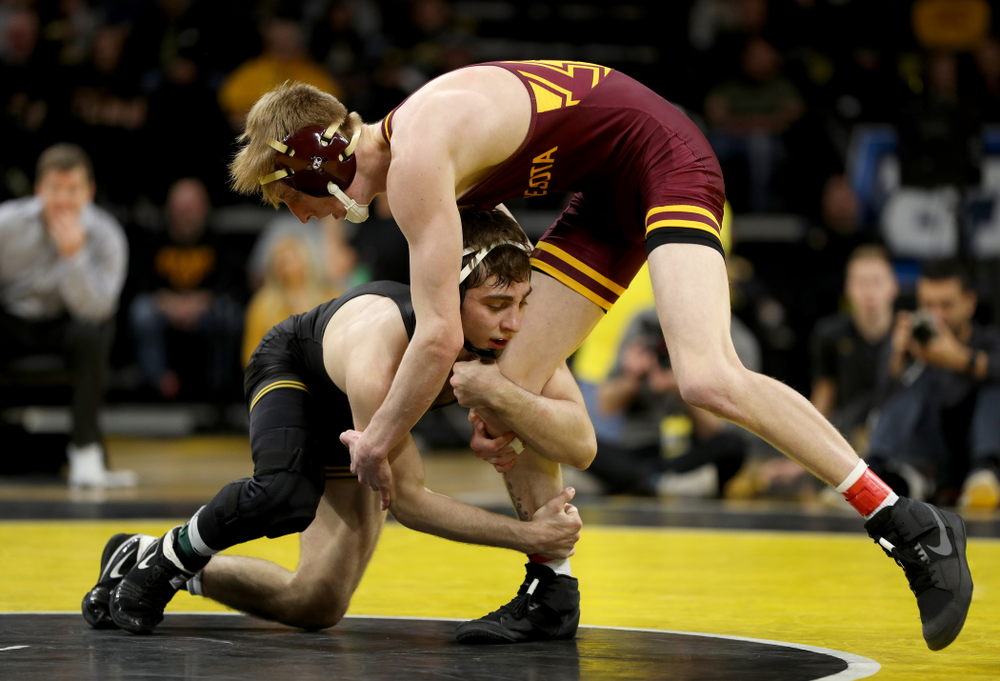 Iowa’s Austin DeSanto wrestles Minnesota’s Boo Dryden at 133 pounds Saturday, February 15, 2020 at Carver-Hawkeye Arena. DeSanto won the match 24-8. (Brian Ray/hawkeyesports.com)
