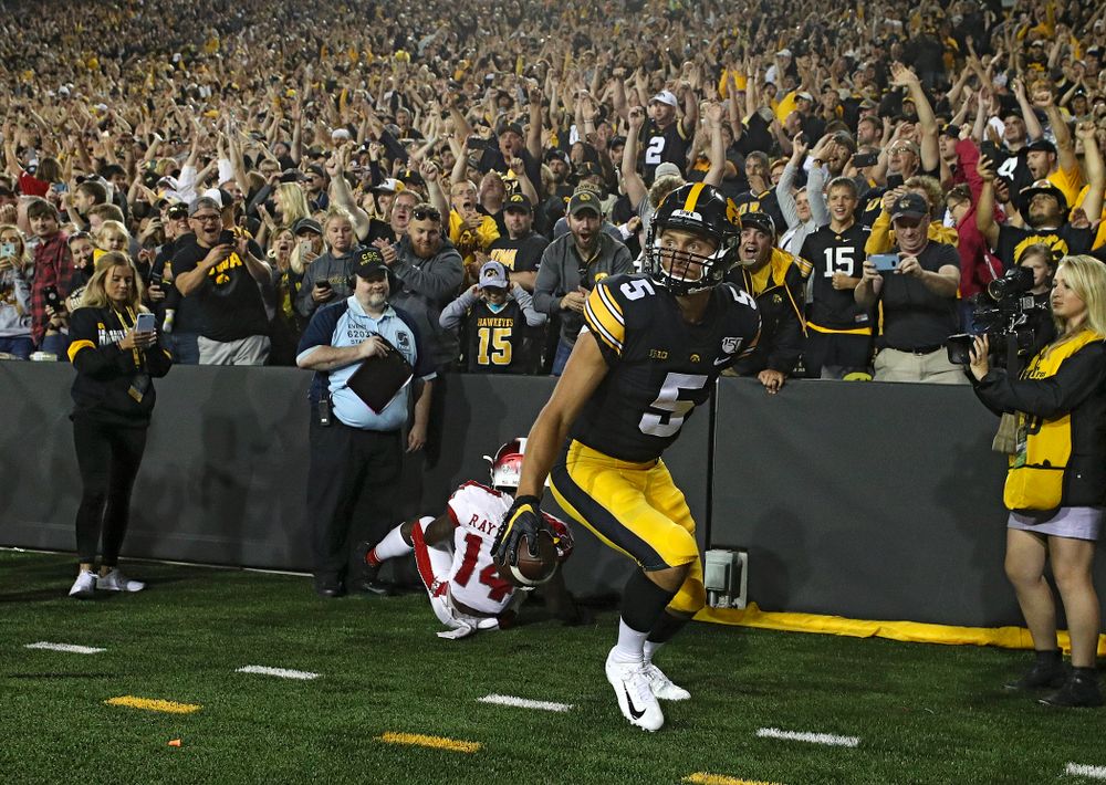 Iowa Hawkeyes wide receiver Oliver Martin (5) gets up after catching a 9-yard touchdown reception during the third quarter of their game at Kinnick Stadium in Iowa City on Saturday, Aug 31, 2019. (Stephen Mally/hawkeyesports.com)