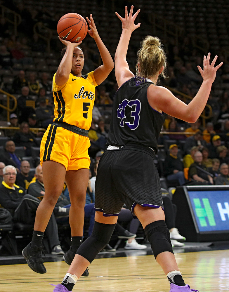 Iowa guard Alexis Sevillian (5) puts up a shot during the third quarter of their game against Winona State at Carver-Hawkeye Arena in Iowa City on Sunday, Nov 3, 2019. (Stephen Mally/hawkeyesports.com)