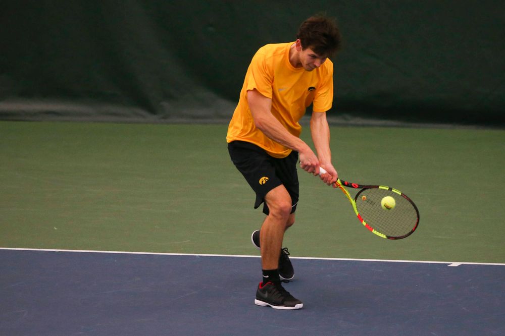 Iowa's Joe Tyler at a tennis match vs Drake Friday, March 8, 2019 at the Hawkeye Tennis and Recreation Complex. (Lily Smith/hawkeyesports.com)