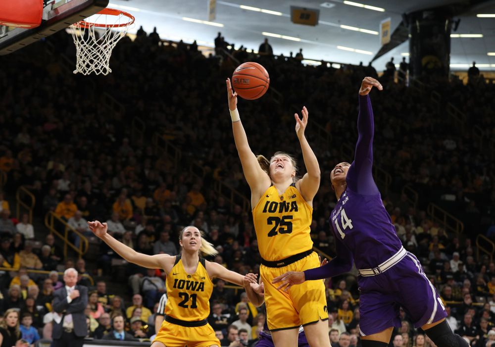 Iowa Hawkeyes center Monika Czinano (25) against the Northwestern Wildcats Sunday, March 3, 2019 at Carver-Hawkeye Arena. (Brian Ray/hawkeyesports.com)